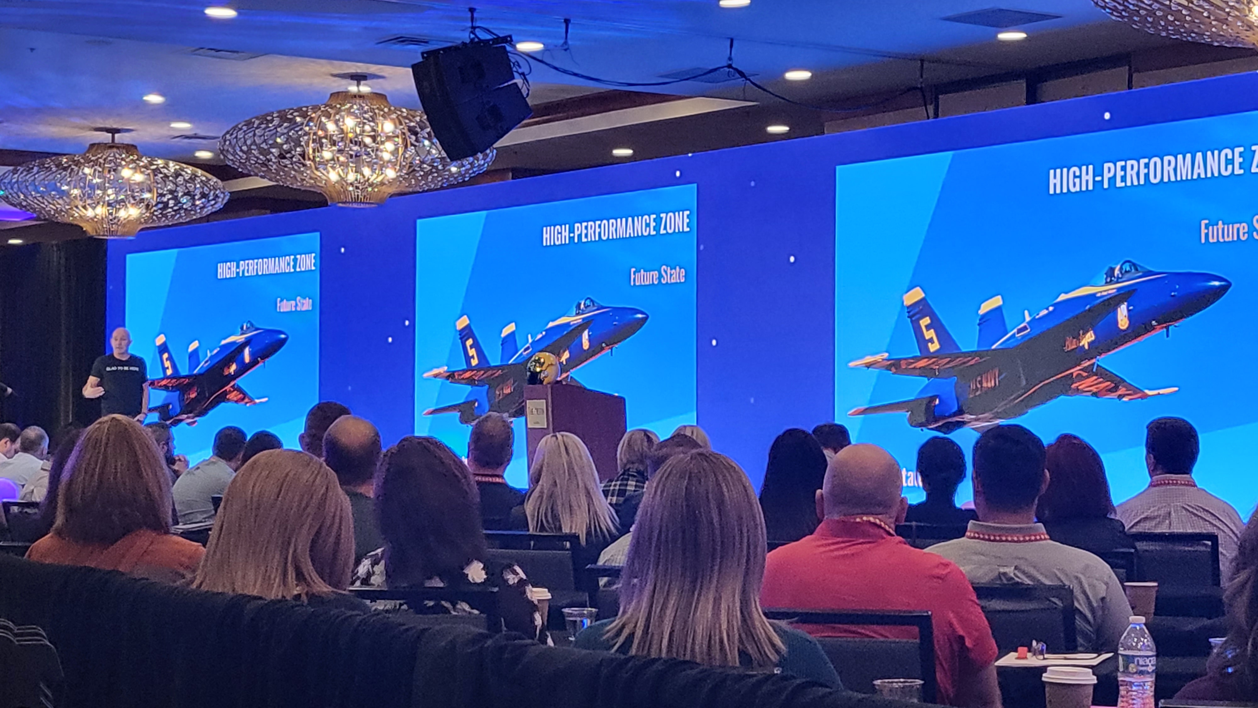 Corporate keynote with large LED wall display at luxury Las Vegas venue